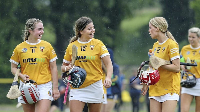 Antrim players Mary McKillen (11), Katie McKillop (12) and Caitrin Dobbin (15) savour Saturday's win over Offaly at Portglenone Picture by Margaret McLaughlin 