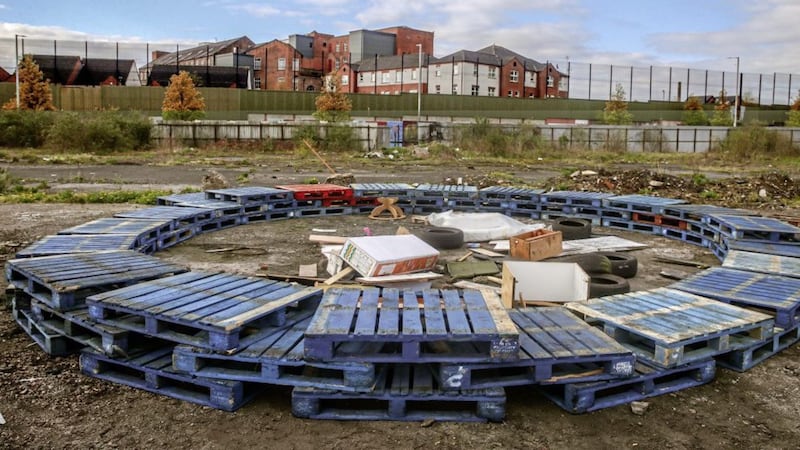 Pallets and other material being used for a bonfire on waste ground between the Shankill and the Falls Road. Picture by Mal McCann 