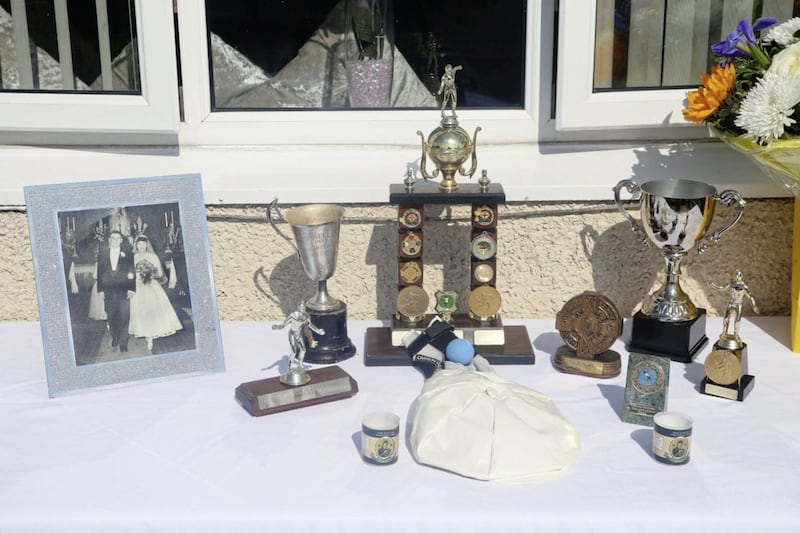 Alec Fitzpatrick's medals, cups and handball glove and cap on show at his funeral in New Barnsley. Picture Mal McCann.
