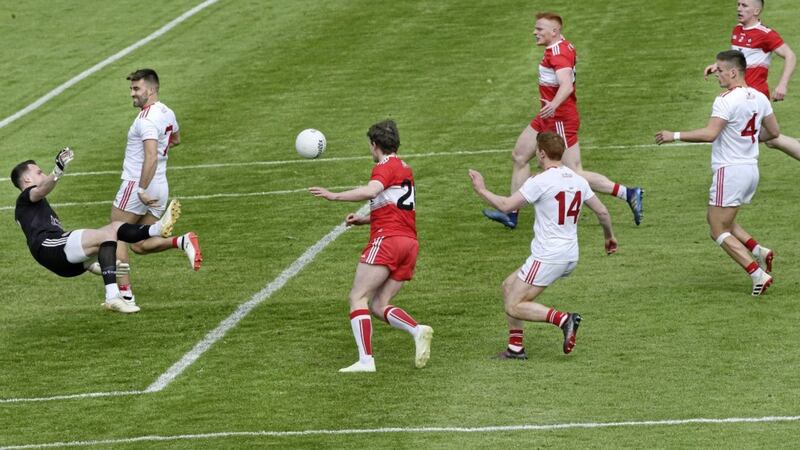 12-05-2019:  Tyrone keeper Niall Morgan blocks the goal effort by Jason Rocks of Derry during the opening minutes of the Ulster Senior Football Championship match at Healy Park, Omagh on Sunday. Picture Margaret McLaughlin 