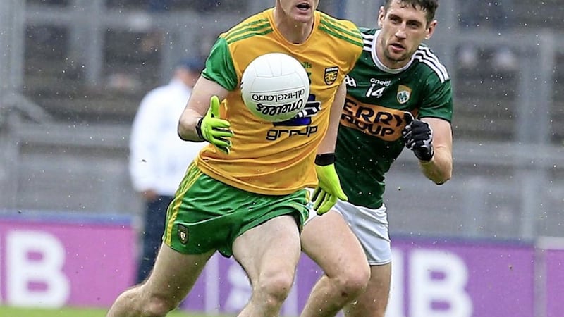 Donegal's Caolan Ward up against Kerry's Paul Geaney in Croke Park last July.<br /> Picture by Philip Walsh