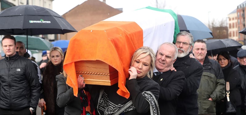 The coffin of Northern Ireland's former deputy first minister and ex-IRA commander Martin McGuinness is carried to his home in Derry after he died aged 66. Picture by Niall Carson, PA