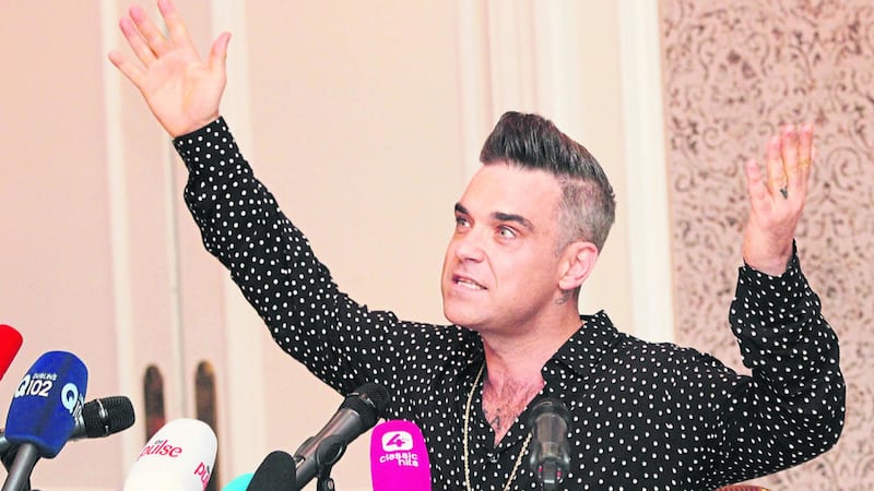 Robbie Williams pictured at a press conference at Dublin&rsquo;s InterContinental last week Picture: Stephen Collins/Collins Photos 