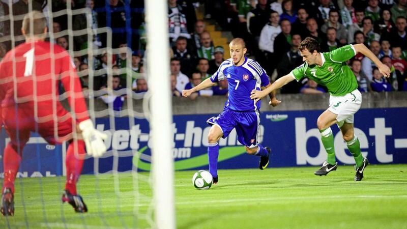 Slovakia&#39;s Vladimir Weiss escapes Jonny Evans to set up his team&#39;s first half goal in a 2-0 win at Windsor Park in 2009. 