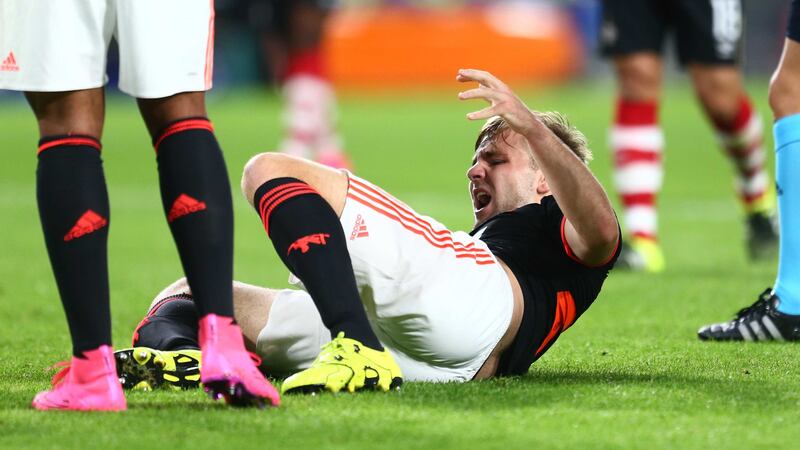 Manchester United's Luke Shaw is left in agony after he broke his leg in two places during Tuesday night's Champions League game against PSV<br />Picture: PA