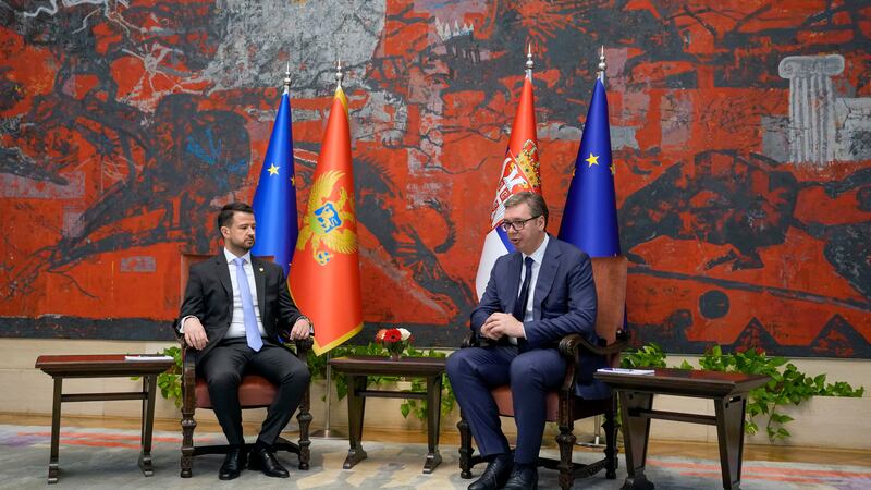 Montenegro’s President Jakov Milatovic, left, speaks during talks with his Serbian counterpart Aleksandar Vucic at the Serbia Palace in Belgrade (Darko Vojinovic/AP)