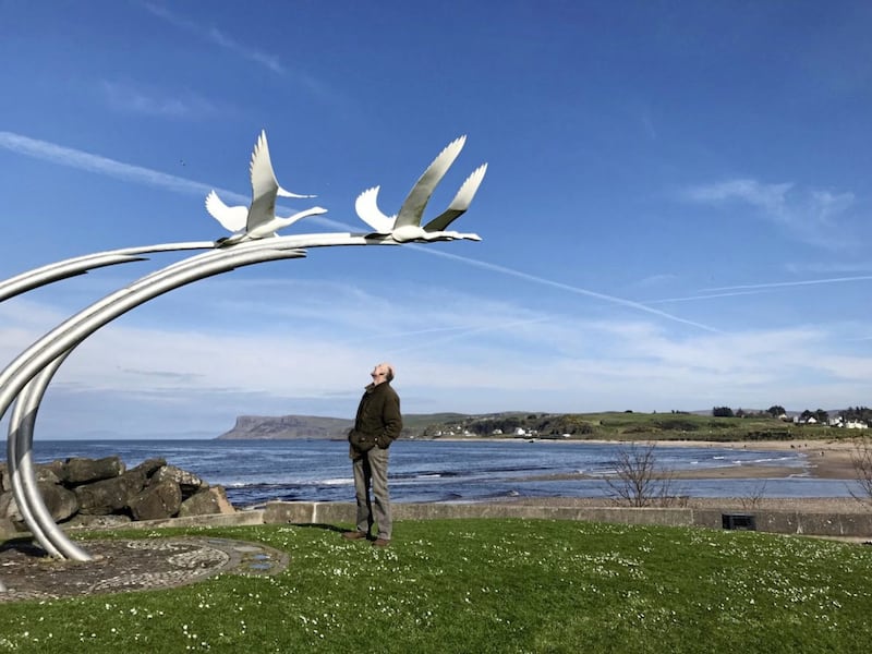 Looking up at the Swan Sculpture on the promenade waterfront at Ballycastle 