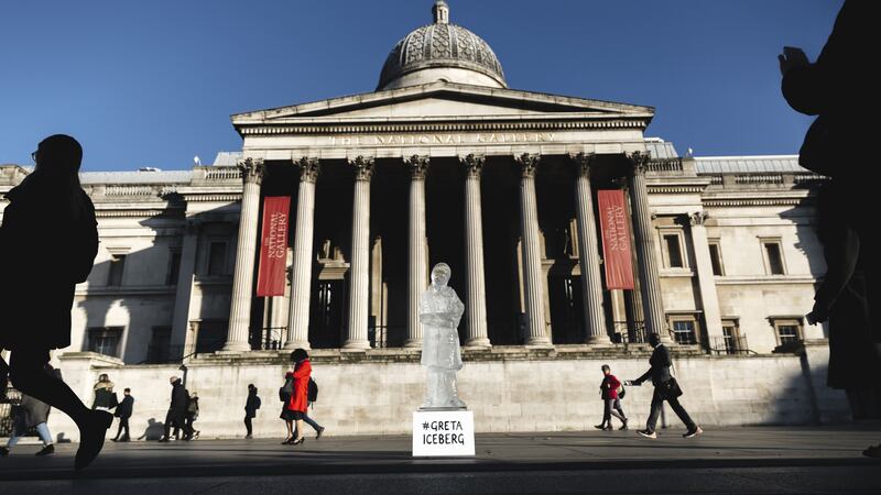 The sculpture, along with a sign reading #GretaIceberg, was assembled in Trafalgar Square on Wednesday morning and melted throughout the day.