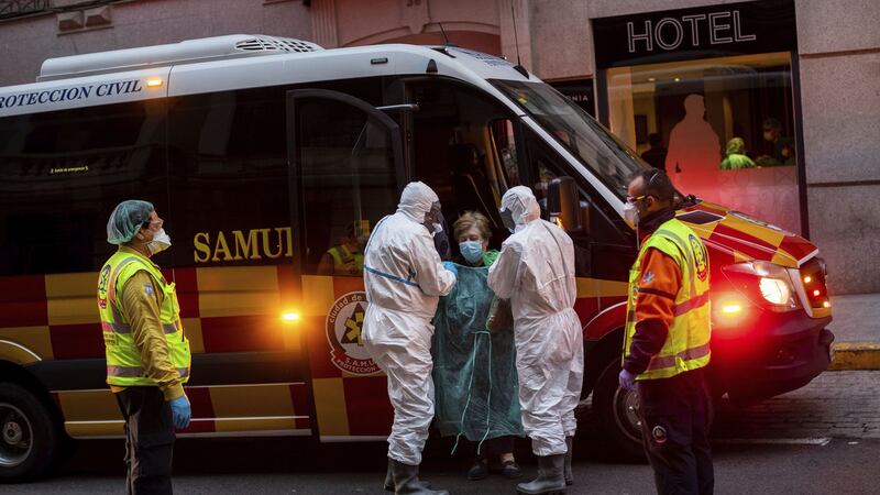 A patient being transferred yesterday to a medicalised hotel during the COVID-19 outbreak in Madrid, Spain. Picture by Bernat Armangue/AP&nbsp;