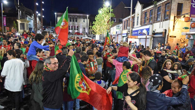 Portuguese fans celebrate after their team wins Euro 2016 on Sunday night. Picture by Pacemaker