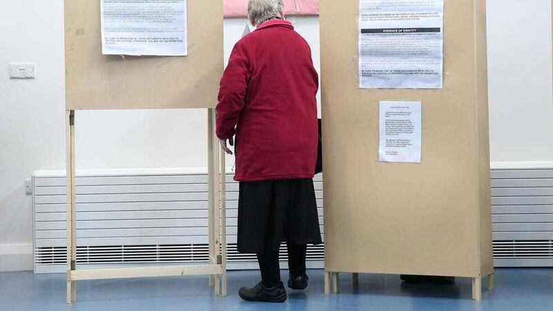 Member of the public makes her way into a polling booth in Castlebar, Mayo. Picture by Brian Lawless/PA Wire 