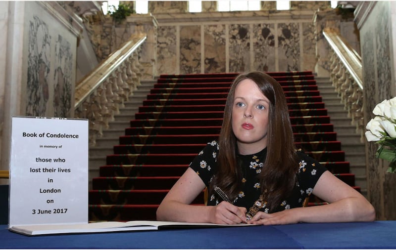 &nbsp;Belfast mayor Nuala McAllister signs the book of condolence at Belfast City Hall. Picture by Hugh Russell