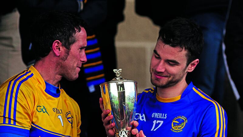Maghery goalkeeper Johnny Montgomery and Eoin Scullion with the Gerry Fegan Cup after their win&nbsp;