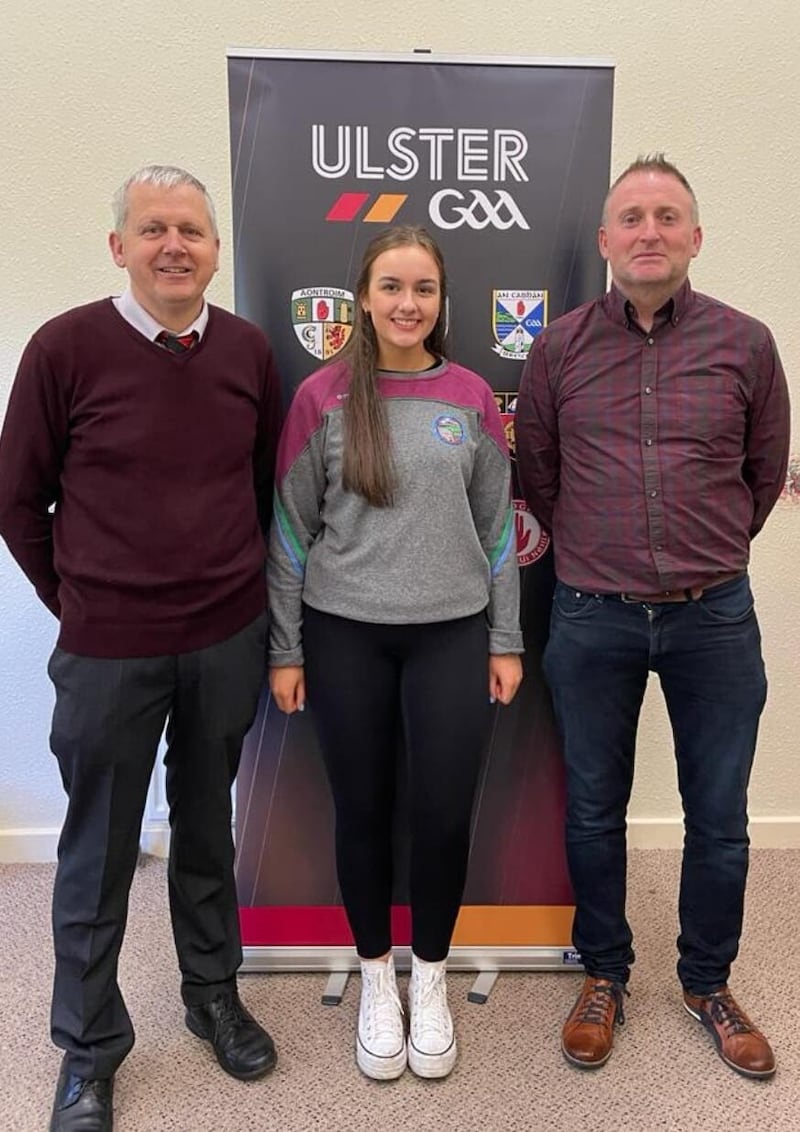 Aoife Grant with Donal McNally, Down cultural officer and Glassdrumman club chairman Gary McGreevy