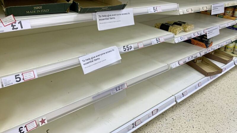 Empty shelves at supermarkets amid coronavirus panic-buying. Picture by Colm Lenaghan/Pacemaker 