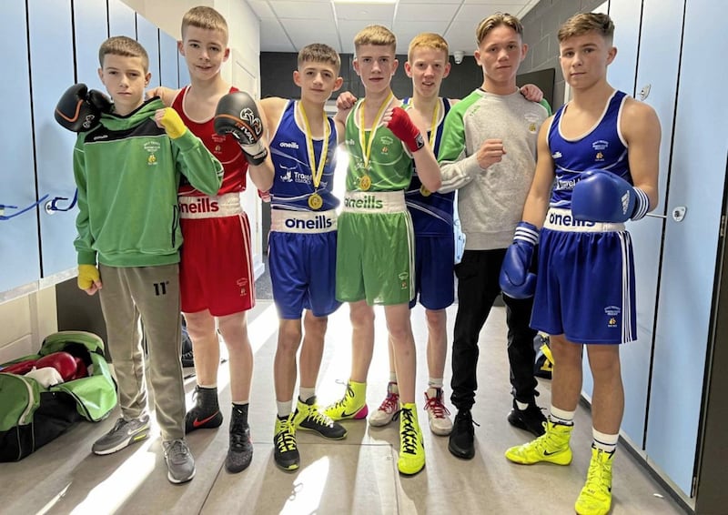 Holy Trinity&rsquo;s Logan Rice, Conal Burns and Cormac Fegan celebrate with club-mates Cormac Curley, James Kelly, Jonny Doherty and Carlo Braniff at the Antrim Open championships, which were held in Brook Leisure Centre. Picture by Mark Marlow 