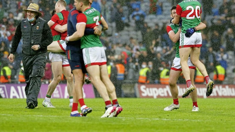 Mayo players celebrate after ending Dublin's seven-year unbeaten run in Championship football.<br /> Pic Philip Walsh
