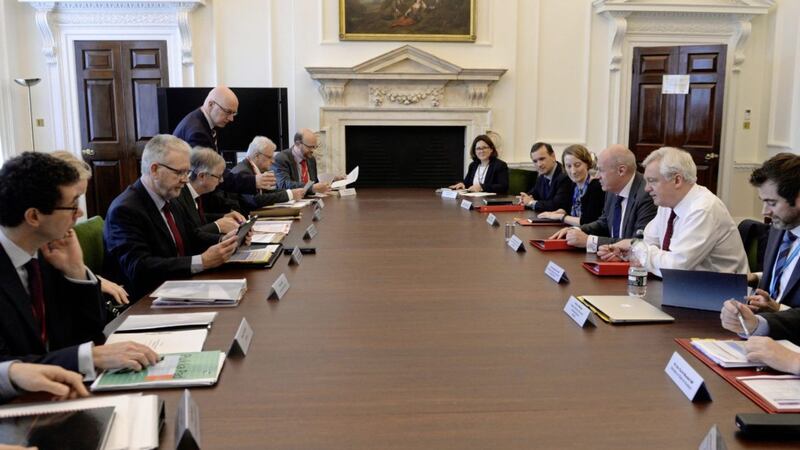 Scottish and Welsh ministers, along with Northern Ireland&#39;s top civil servant David Sterling, meet First Secretary of State Damian Green and Brexit Secretary David Davis during a Joint Ministerial Council on Brexit in the Cabinet Office yesterday 