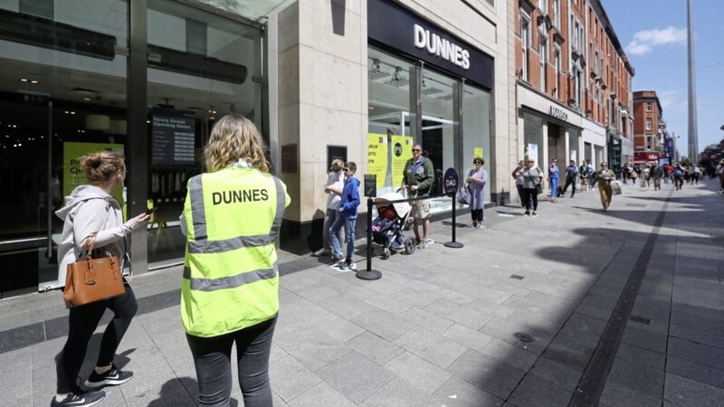 People queueing outside Dunnes stores in Dublin. Picture by Niall Carson, Press Association 