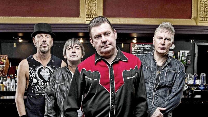 Jake Burns (front) of the Stiff Little Fingers has endorsed a campaign for a blue plaque to be placed at the site of punk-rock venue Trident in Bangor, made famous in the song &#39;Alternative Ulster&#39; 