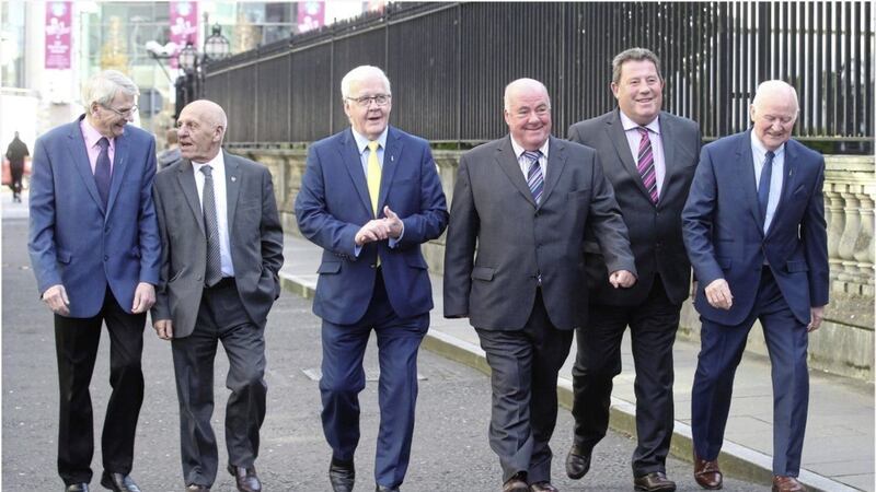 Liam Shannon, Francis McGuigan, Jim Auld, Joe Clarke, Kevin Hannaway, and Brian Turley on their way out of the High Court in Belfast yesterday. Picture by Hugh Russell 