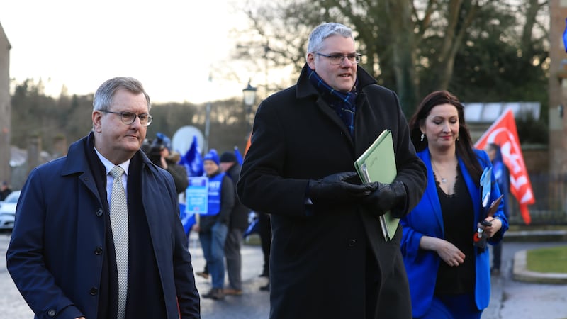 (l to r) Sir Jeffrey Donaldson, Gavin Robinson and Emma Little-Pengelly leave Hillsborough Castle in January