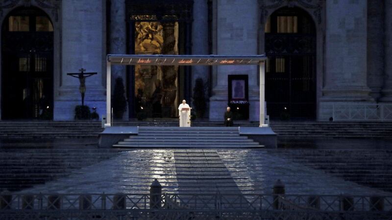 Pope Francis delivers the Urbi and Orbi blessing &#39;to the City and to the World&#39; to a desolately empty St Peter&#39;s Square. Picture by AP Photo/Alessandra Tarantino 