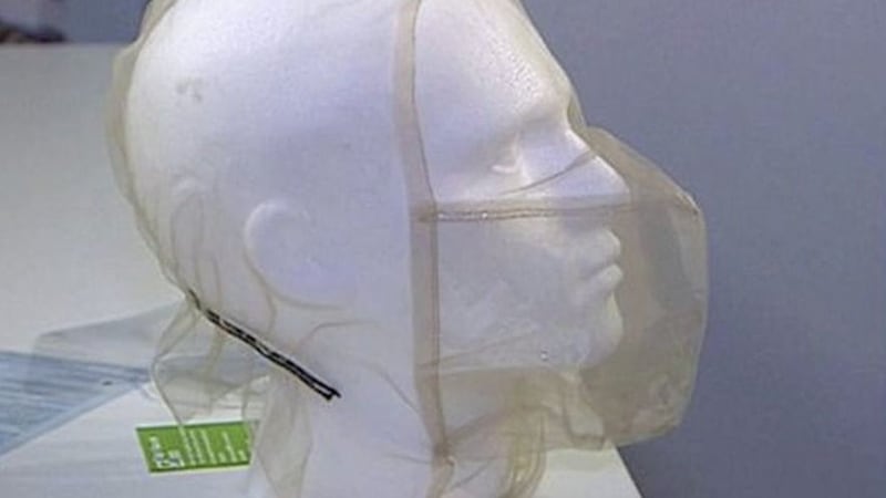 Spit hoods placed on the heads of suspects to reduce the risk of police officers being infected with coronavirus 
