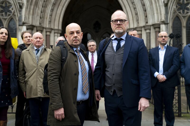 Journalists Barry McCaffrey (left) and Trevor Birney (right) outside the Royal Courts of Justice in London