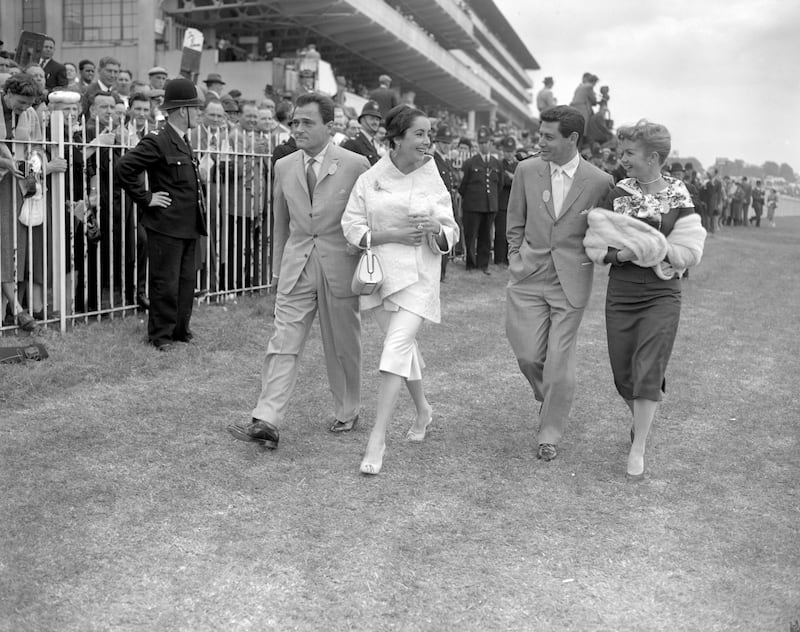 Debbie Reynolds, right, at the Derby, with, from left, Mike Todd, actress Elizabeth Taylor, and singing star Eddie Fisher in 1957. Picture by Press Association  &nbsp;