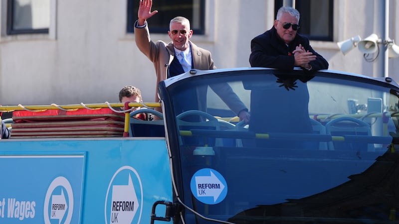 Mark Butcher, left, the Reform UK candidate for the forthcoming Blackpool South by-election, and Lee Anderson on an open top bus during a campaign event