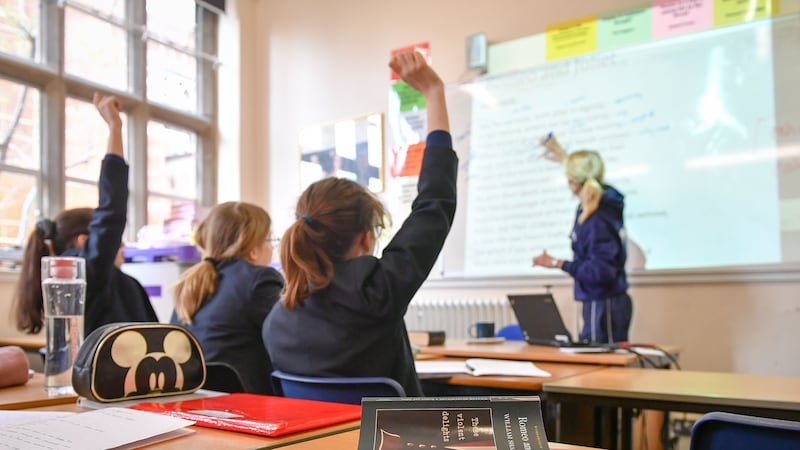 File photo dated 12/09/18 of a teacher and students in a classroom. Only one in 10 state schools say all their pupils are studying a language at GCSE level, compared with nearly a third of private schools, a report suggests .Issue date: Thursday June 29, 2023.