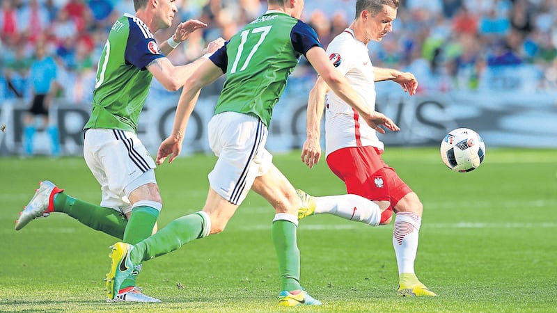 &nbsp;Northern Ireland&rsquo;s Paddy McNair (centre) is expecting a very different performance against Ukraine after the defeat to Poland on Sunday&nbsp;<br />Picture by PA