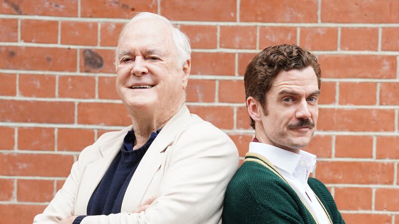 John Cleese with Adam Jackson-Smith as Basil Fawlty pose before the opening of Fawlty Towers The Play