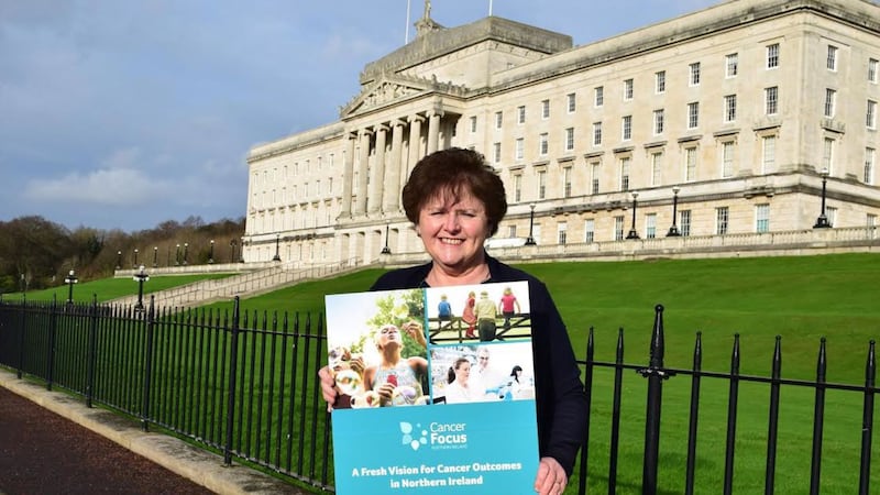 Cancer Focus NI&rsquo;s chief executive Roisin Foster with the charity's new pledge urging political parties to help tackle cancer&nbsp;