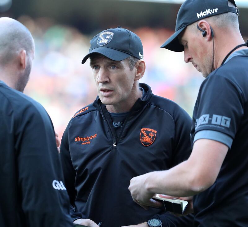 Armagh manager Kieran McGeeney with assistants Ciaran McKeever (left) and Kieran Donaghy (right)