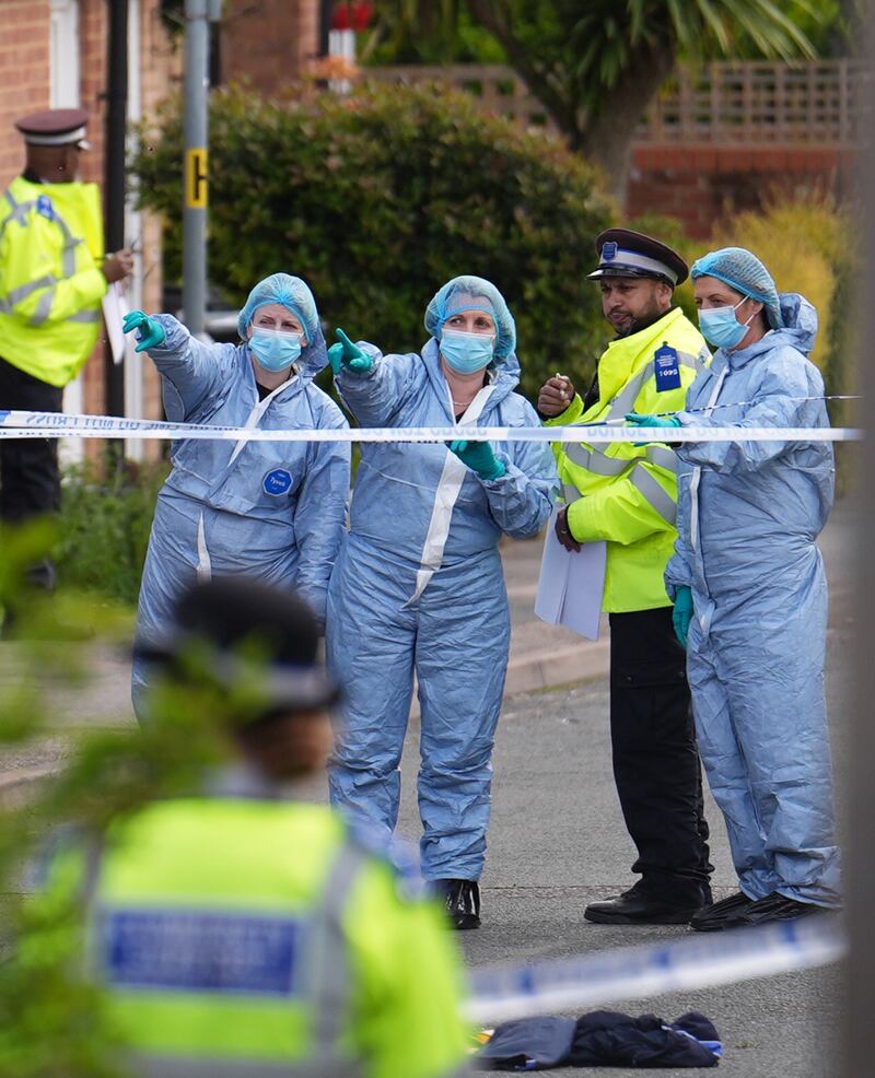 Forensic investigators in Laing Close in Hainault, east London