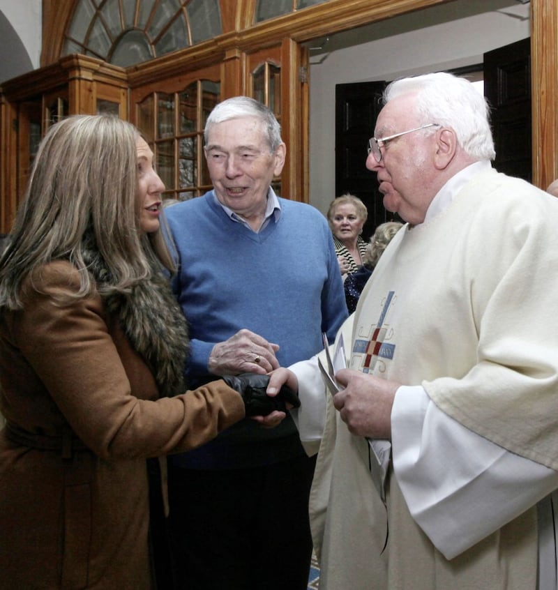 Fr Eugene McCarthy, Rector at Holy Cross, greets members of the congregation after a Mass of Thanksgiving on Sunday to celebrate 150 years of the &#39;People and Passionists&#39; in Ardoyne. Picture by Ann McManus 